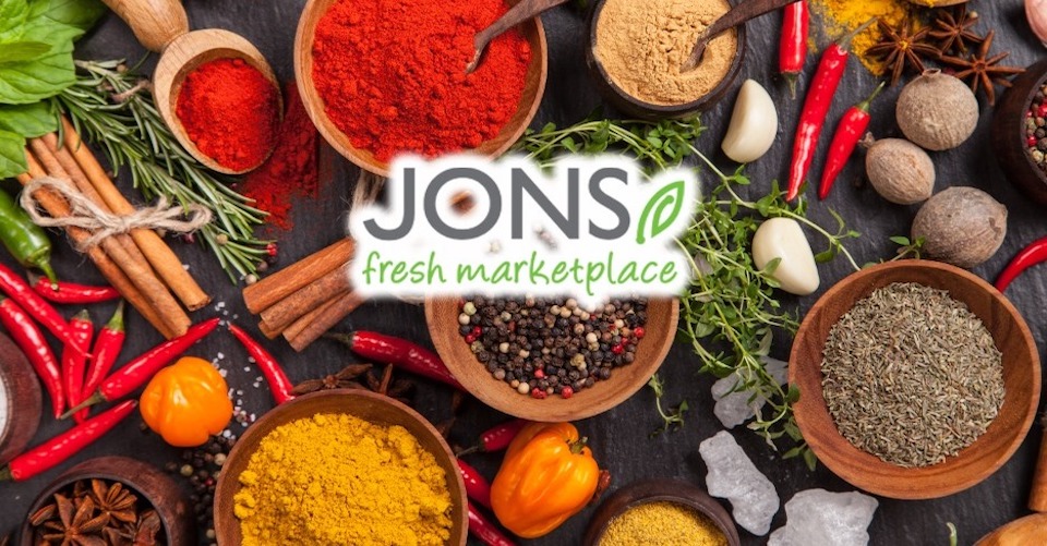 Jons Fresh Marketplace logo with ingredients background